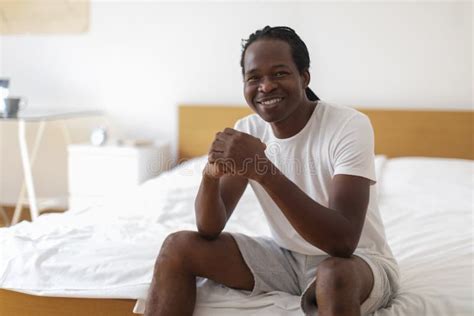 black man sitting on edge of bed meme|Get to know the man behind one of the COVID era’s raunchiest。